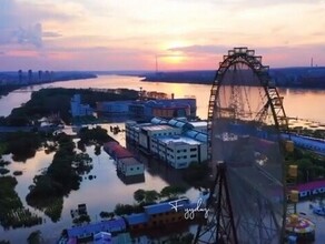 На острове в Хэйхэ затоплены таможня и торговые центры В Китае на границе с Приамурьем жители готовятся к эвакуации фото видео