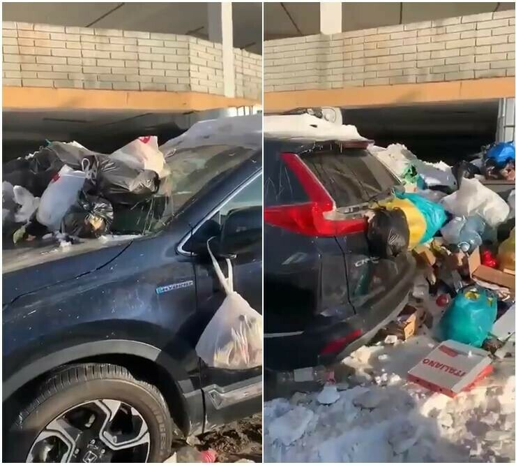 Такие нравы Во Владивостоке машину возле контейнерной площадки закидали мусором 