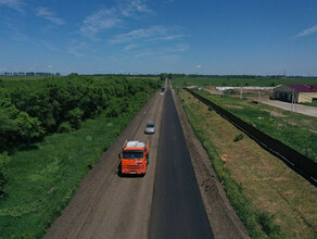 В Тамбовском районе заканчивается укладка нового асфальта на региональной трассе