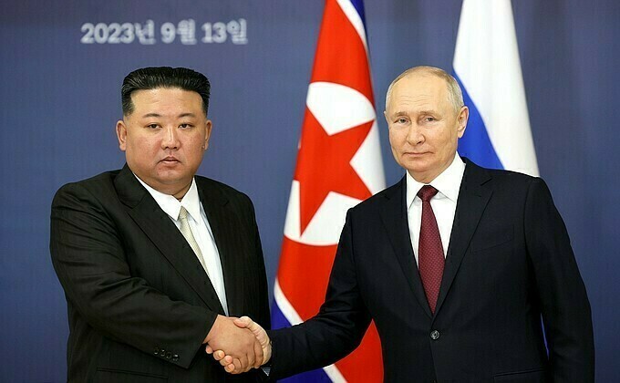 Ким Чен Ын получил в подарок карабин и перчатку Что подарили Путину