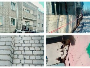Трещины на фасаде и отслоение кирпичей в Райчихинске разрушается многоквартирный дом