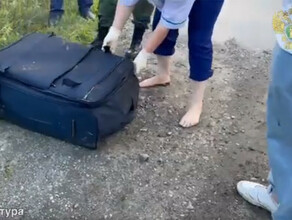 Дети нашли в реке чемодан с трупом мужчины видео