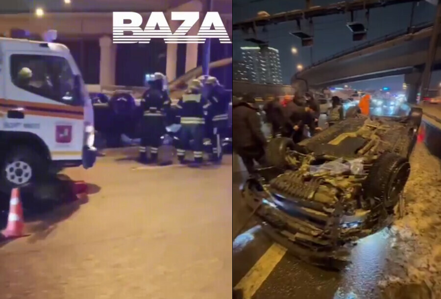 Два человека погибли при падении автомобиля с эстакады на другие машины